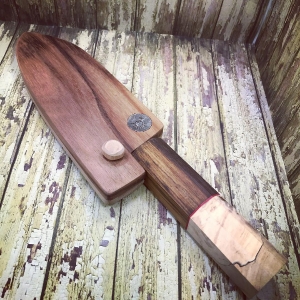 Knife in wooden holder